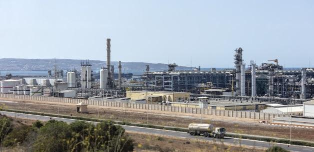 TOTAL, SONATRACH INVESTMENT $1.4 BLN