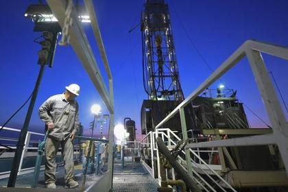 U.S. RIGS DOWN 21 TO 991